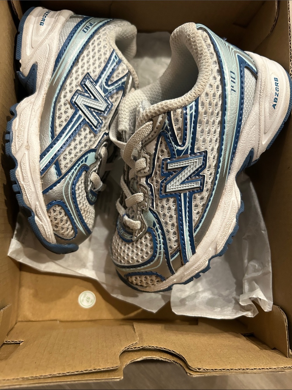 New Balance Kids White and Light Blue Athletic Sneakers